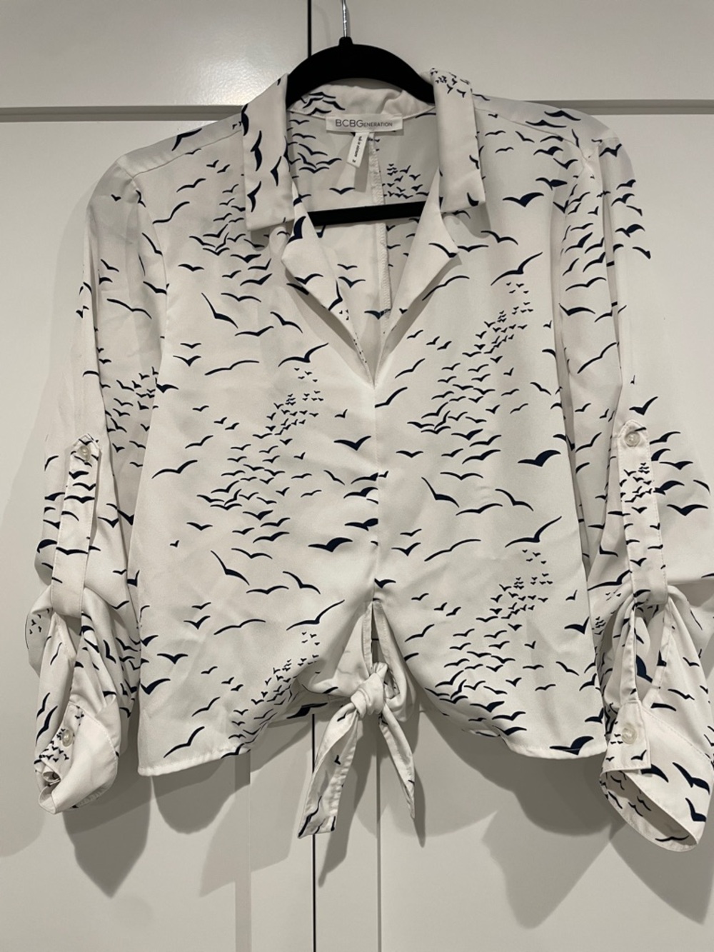 BCBGMaxAzria White Blouse with Navy Bird Print and Front Tie